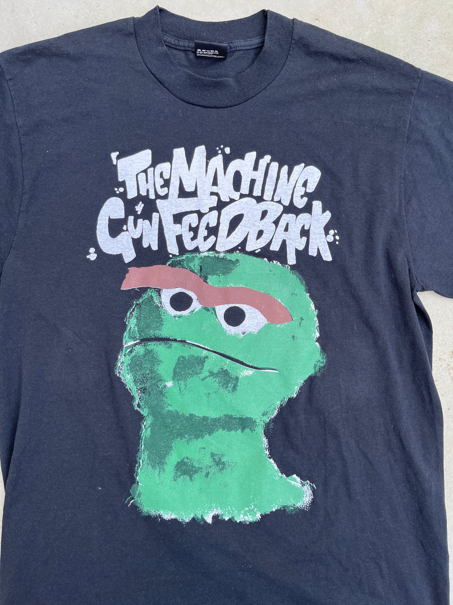 The Machine Gun Feedback 90s Tee