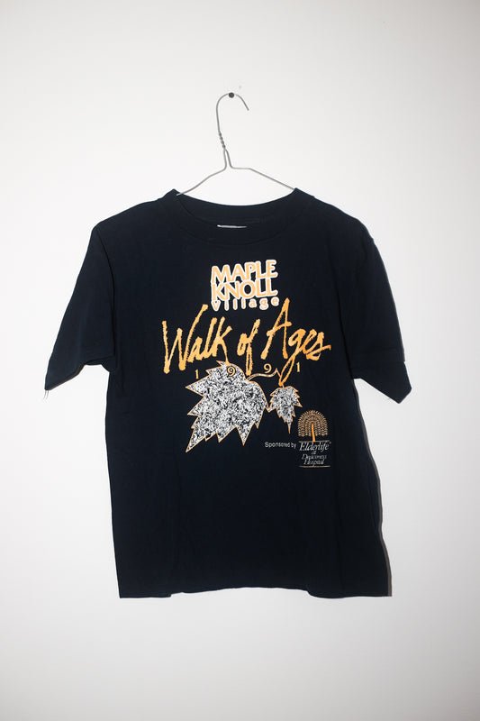 Black t-shirt with graphic design and text on a white background